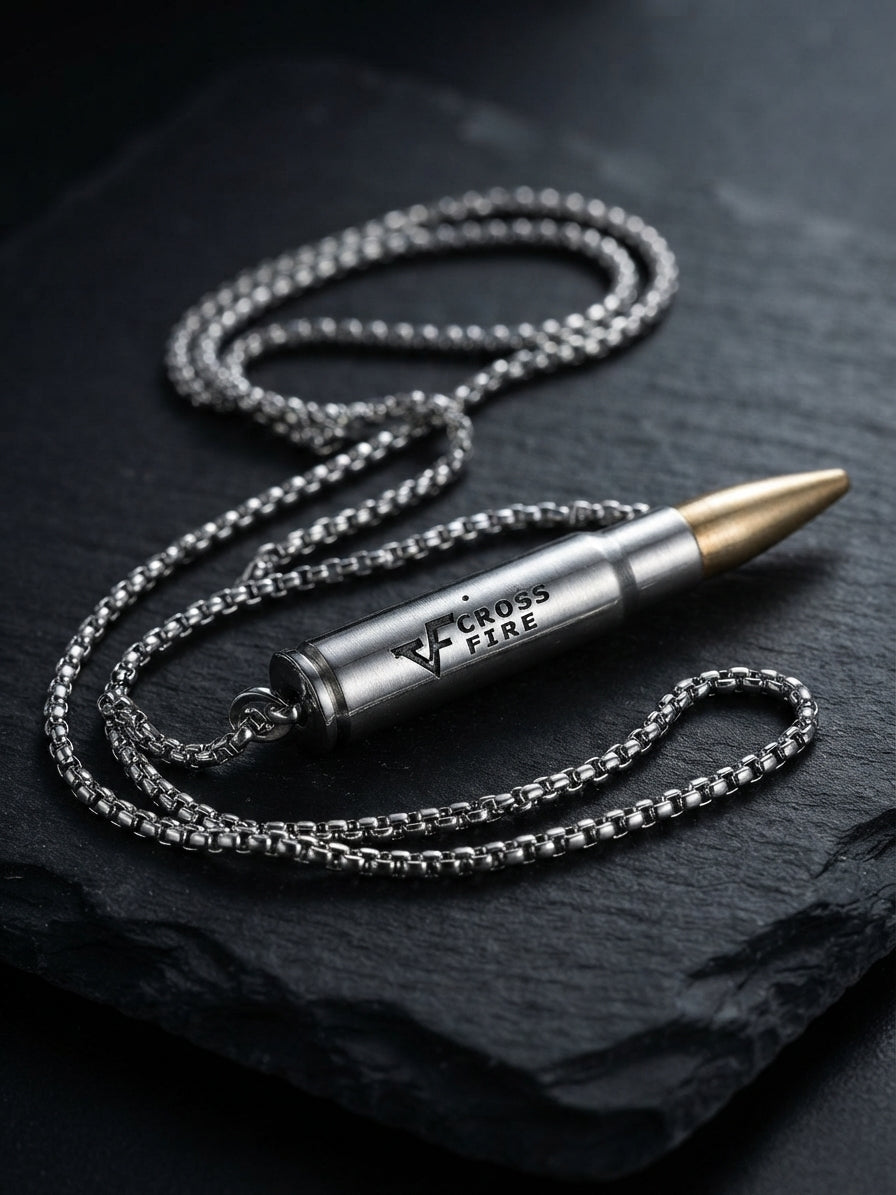 Collana con ciondolo a proiettile "cross fire" in acciaio inossidabile e punta dorata